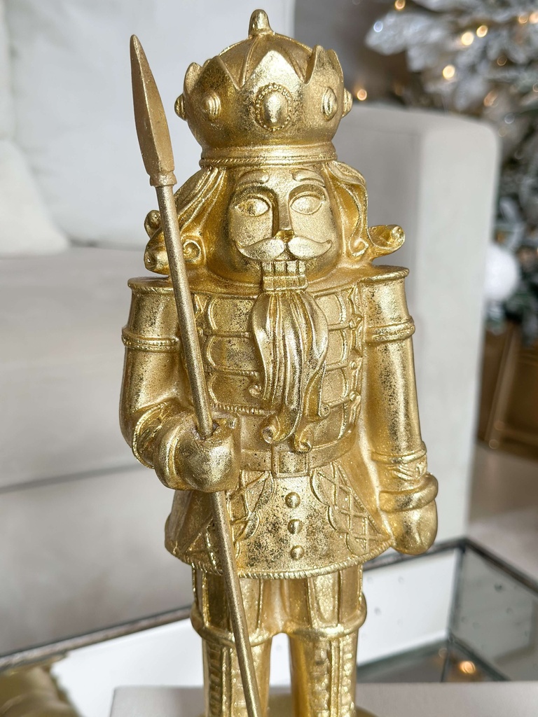 Nutcrackers dorados hoja de oro