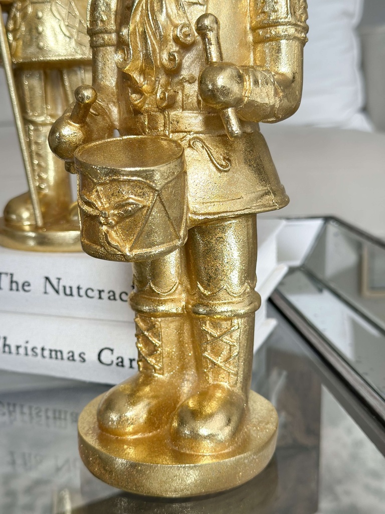 Nutcrackers dorados hoja de oro